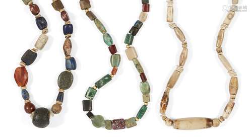 A group of three bead necklaces of mixed ancient and modern beads the first comprised of hardstone