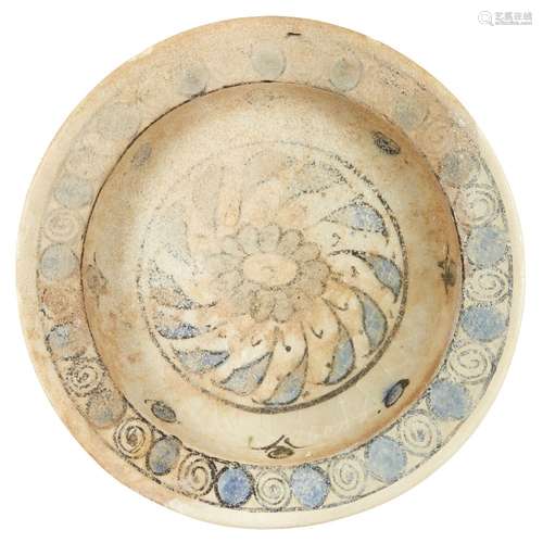 An early Miletus ware blue and white dish, Turkey, 15th century, of shallow form with raised foot