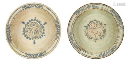 Two early Cannakale pottery bowls, Turkey, 18th century, of deep form, each decorated to centre well