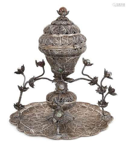 A domed silver filigree Ottoman sweets dish, Turkey, 19th century, attached by four legs on a