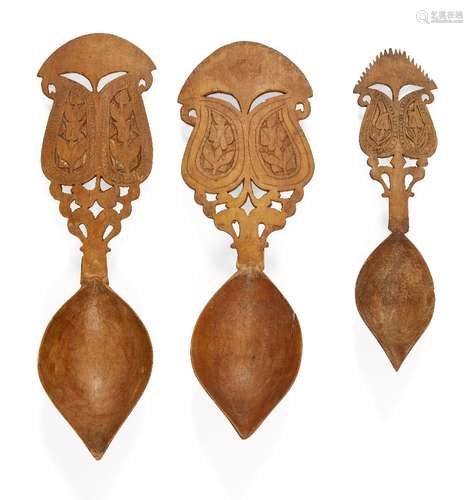 Three pearwood sherbet spoons, Abadeh, Iran, late 19th century, with deep spoon, carved openwork