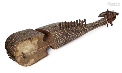 A Rubab, Afghanistan, early 20th century, the short-necked lute made of wood with goat skin,