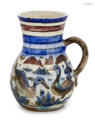 A small Qajar jug with birds, Iran, 19th century, of globular form, with curved handle, the neck