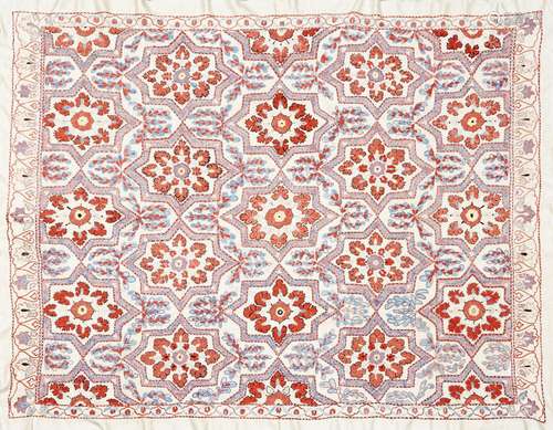 A Tashkent embroidered susani panel, Central Asia, 20th century, the cream cotton ground embroidered