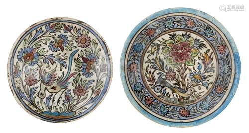 Two Qajar pottery dishes with birds and flowers, Iran, late 19th-early 20th century, of deep form