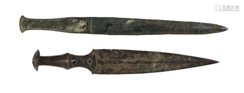 Two Luristan daggers, 9th-7th century B.C., South West Iran, the first with rectangular shaped
