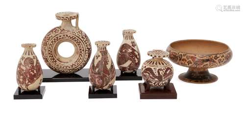 A group of reproduction Corinthian style pottery vessels, including a stemmed dish, 8cm high, 15cm