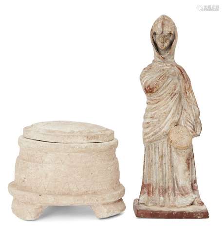 A reproduction Greek style ‘Tanagra’ figure, the standing female figure enveloped in a himation