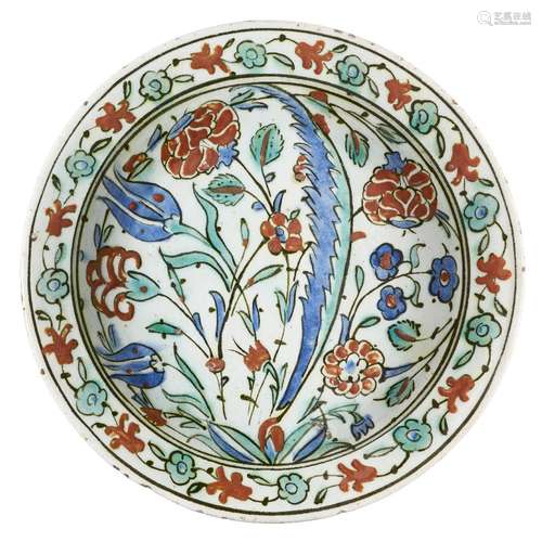 A large intact Iznik pottery dish, Turkey, circa 1600, underglaze painted in cobalt blue,