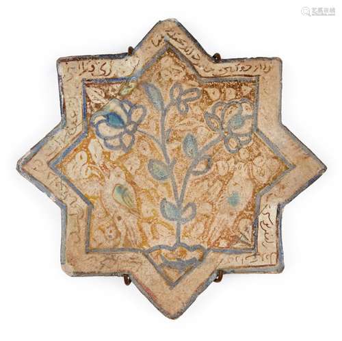 A Kashan lustre pottery star tile, heavily restored, Iran, 13th century, the lustre ground painted