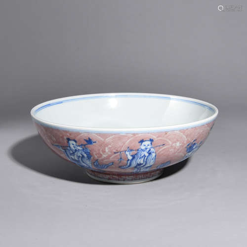 A BLUE AND WHITE BOWL PAINTED WITH CHARACTERS