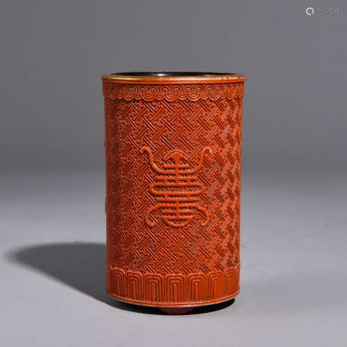 A RED GLAZE AND PORCELAIN CARVED  PEN CONTAINER
