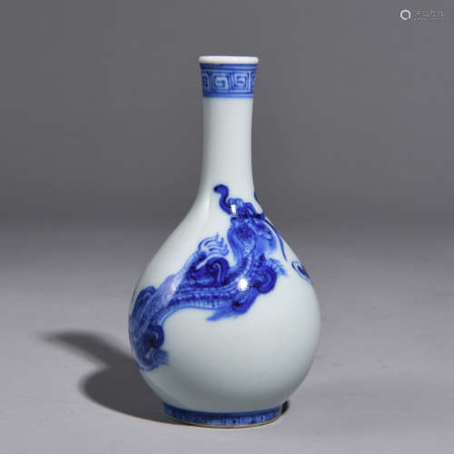 A BLUE AND WHITE BOTTLE  WITH BEAST PATTERNS