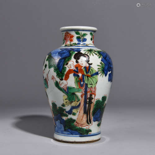A MUTICOLOURED BOTTLE PAINTED WITH CHARACTERS