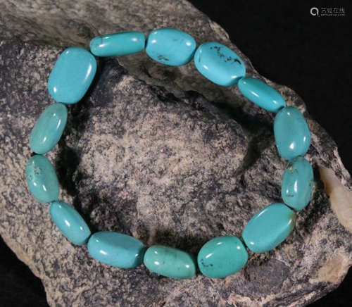 TURQUOISE STRING BRACELET WITH 14 BEADS