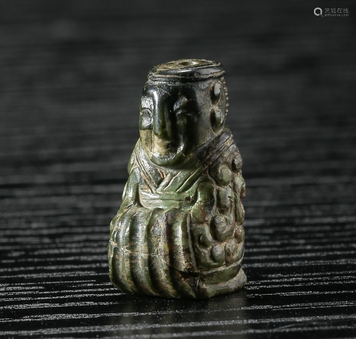 A HAN ARCHAIC TURQUOISE FIGURE PENDANT