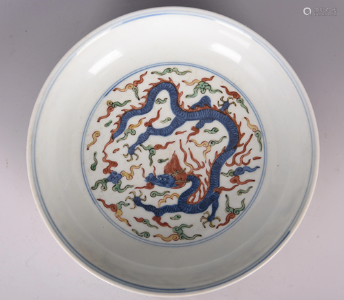 A MULTICOLORED DRAGON PORCELAIN PLATE