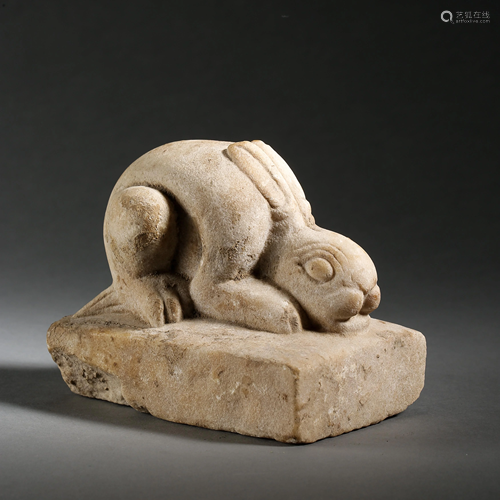 A STONE CARVED RABBIT ORNAMENT