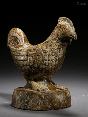 A STONE CARVED ROOSTER ORNAMENT