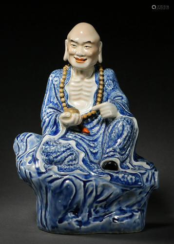 A PORCELAIN CARVED BONY ARHAT STATUE