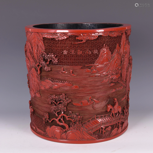 AN INTRICATELY CARVED RED CINNABAR LACQUERED BRUSH POT,