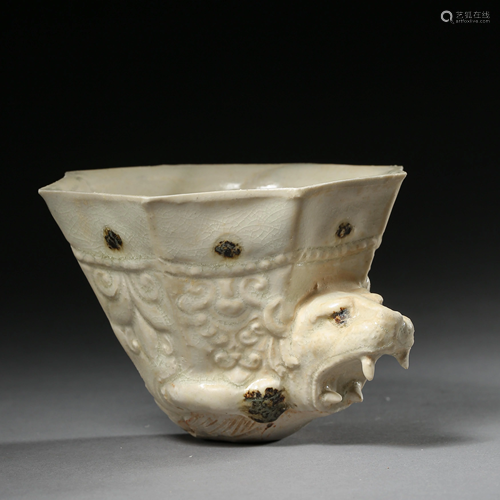 A WHITE GLAZED PORCELAIN BEAST HEAD-SHAPED CUP