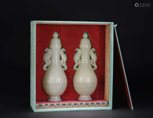 A PAIR OF CHINESE WHITE JADE VIEWS VASES