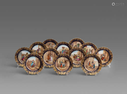 TWELVE ROYAL VIENNA STYLE HAND-PAINTED DISPLAY PLATES WITH GOLD DEPICTION