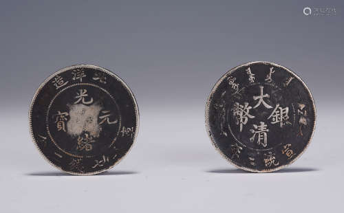 TWO CHINESE SILVER CIONS