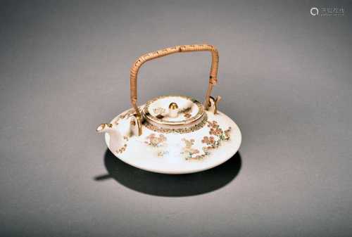 A Japanese Satsuma teapot and cover