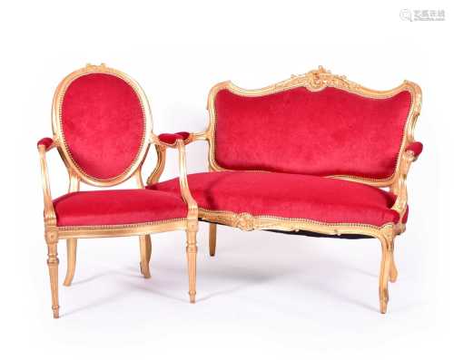 A pair of 19th century, Louis XVI style, gilded armchairs