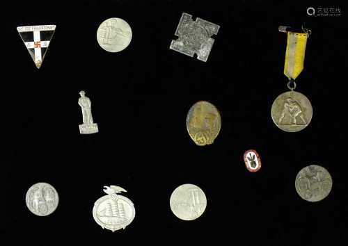 A collection of WW2 German Third Reich medals, badges and aw...