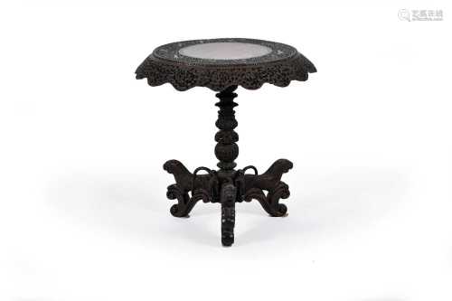 A Burmese carved hardwood table