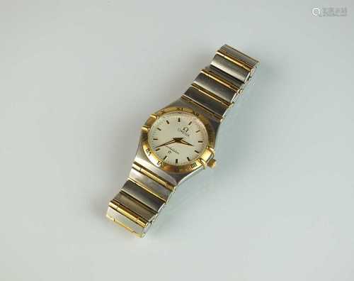 A Lady's Omega constellation stainless steel and gilt wristw...