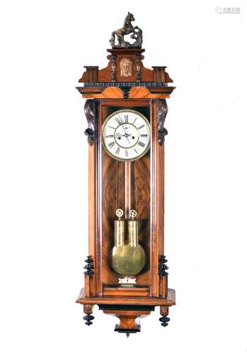 A large walnut and mahogany Vienna type wall clock