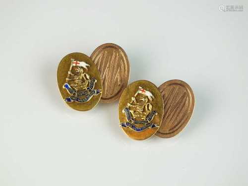 A pair 9ct gold and enamel cufflinks