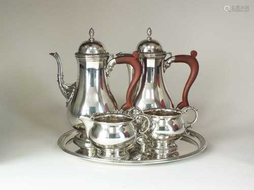 A George III style four piece silver coffee service and tray