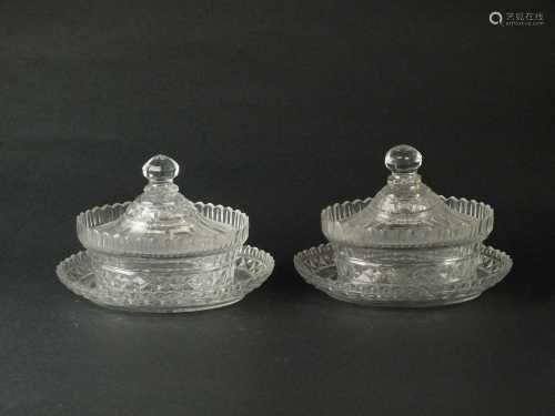 A pair of George III Irish oval cut glass butter dishes,