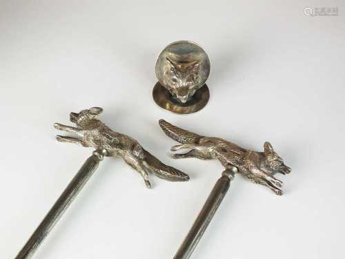 A pair of silver fox handled boot pulls