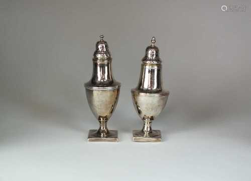 Two George III silver sugar casters