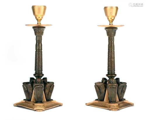 A pair of French parcel gilt bronze Egyptian revival candles...