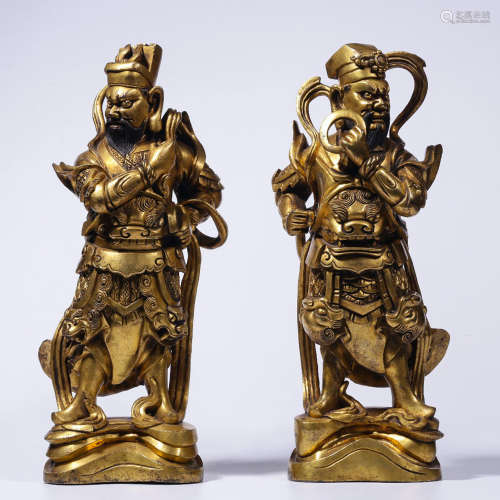 A PAIR OF GILT BRONZE GATE GODS, QING DYNASTY, CHINA