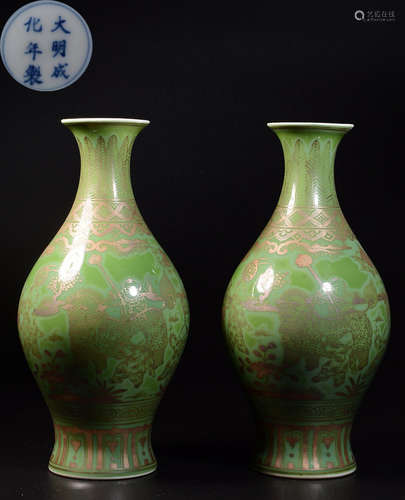 PAIR OF GREEN GLAZE CHILD PATTERN VASES