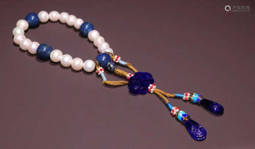 PEARL STRING BRACELET WITH 18 BEADS