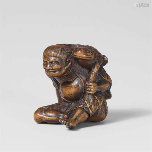 A boxwood netsuke of a grumpy Gama Sennin. Mid-19th century