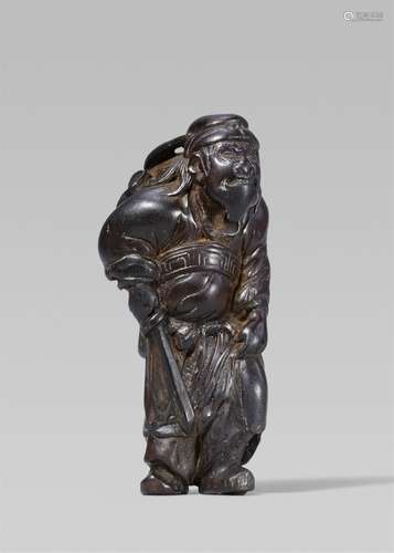 A wood netsuke of Shoki. Early 19th century