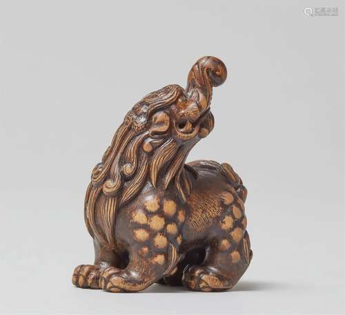 A wood netsuke of a baku. Early 21th century