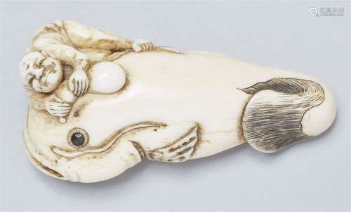 An ivory netsuke of Kadori Myojin on a namazu. Early 19th ce...