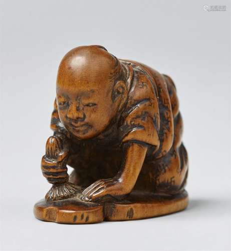 A boxwood netsuke of a man. 19th century