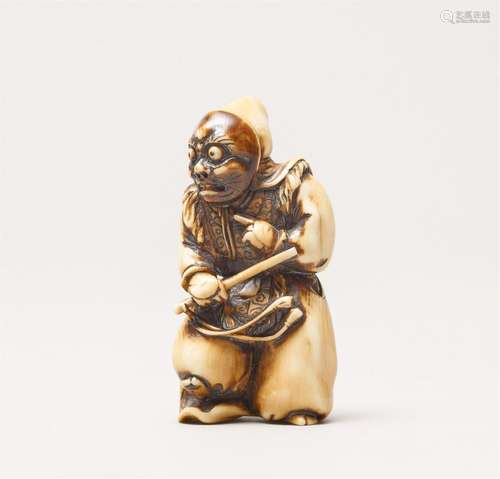 An ivory netsuke of a bugaku dancer. 19th century